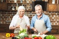 Wife and husband cooking salad Royalty Free Stock Photo