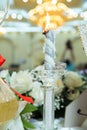 Wife and husband dancing, rings, champaigne, hands, candles, elegant. The bride and groom`s ring on the candle at the wedding .