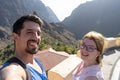 Wife and husband taking a selfie, smiling on a trip in their Honeymoon at Masca, Tenerife.