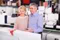 Wife and husband are visiting shop of household appliances for s Royalty Free Stock Photo