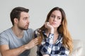 Wife offended by husband, man asks forgiveness Royalty Free Stock Photo