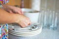 Wife seting table for for future guests Royalty Free Stock Photo