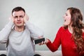 Wife shouting at husband. Cheating man. Betrayal. Royalty Free Stock Photo