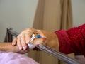 Wife visiting husband in hospital. Senior couple holding hands on hospital bed for hospitalization for supporting his dear. Concep Royalty Free Stock Photo