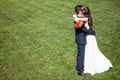 Wife in wedding dress embrancing the husband Royalty Free Stock Photo