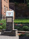 WiFi sign on a stone pillar in Monschau, Germany
