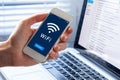 WiFi symbol, smartphone screen, button to connect to wireless internet