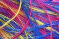 Wig of synthetic hair with colored strands for carnival as background