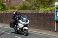 WIGAN, UK 14 SEPTEMBER 2019: A photograph documenting a live broadcast TV camera motorcycle outfit as part of the Tour of Britain