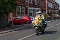 WIGAN, UK 14 SEPTEMBER 2019: A photograph documenting police advance riders creating clear roads for the Tour of Britain race in