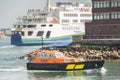 Wightlink ferry and pilot tug