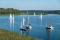 WIGRY, POLAND - AUGUST 2019: many yachts stand on the pier and prepare for the regatta