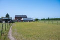 Wijgmaal, Leuven, , Belgium - Farm, fenced lawn and staples at the Flemish countryside