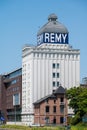 Wijgmaal, Leuven, Belgium - The industrial plant of the Remy company, producing rice starch, reflecting in the canal