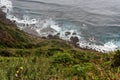 Wild Atlantic Ocean with small stone beach and waves in Madeira Royalty Free Stock Photo