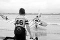 Wild Atlantic windsurfers getting ready to race and surf