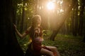 Wild attractive woman in forest. Folklore character. Female spirit mythology. Living wild life untouched nature. Sexy