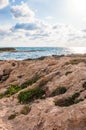 Beach with cliffs and rocks inside the Mediterranean Sea in North Israel near Rosh Hanikra Royalty Free Stock Photo