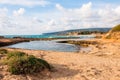 Remote wild beach with cliffs and rocks inside the Mediterranean Sea in North Israel near Rosh Hanikra Royalty Free Stock Photo