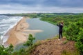 Wild beach with turquoise green sea Royalty Free Stock Photo