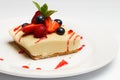 Wild berry cheesecake on a white plate Royalty Free Stock Photo