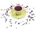 Wild berry tea in green cup with hibiscus leafs Royalty Free Stock Photo