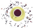 Wild berry tea in green cup with hibiscus leafs Royalty Free Stock Photo