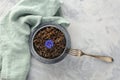 Wild black rice with an edible flower, a blue cornflower, shot from above with a fork Royalty Free Stock Photo