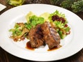 Wild Boar Steak with Vegetables and Mushrooms Royalty Free Stock Photo