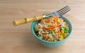 Wild and brown rice with veggies in bowl with fork Royalty Free Stock Photo