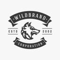 Wild carnivorous angry wolf head hunting vintage textured logo place for text vector illustration Royalty Free Stock Photo