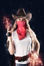 Wild cowboy girl with gun closeup Royalty Free Stock Photo