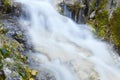 Wild creek falling down a hill Royalty Free Stock Photo