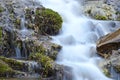 Wild creek falling down a hill Royalty Free Stock Photo