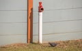 Wild dove looking for water from a fire hydrant