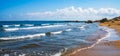 Wild empty beach on the sea coast