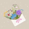 wild flowers in an envelope with a bow Royalty Free Stock Photo