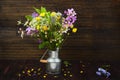 Wild flowers in a metal bucket Royalty Free Stock Photo