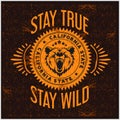 Wild and Free vintage typography with a head of grizzly Bear, t-shirt print graphics