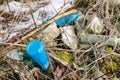 Wild garbage dump. residual glass, plastics in the forest Royalty Free Stock Photo
