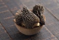 A Bowl of Wild Harvested Morel Mushrooms Trimmed and Dried