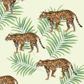 Wild leopards with tropical leafs