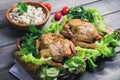 Wild and long grain white rice in a wooden bowl, two baked chick Royalty Free Stock Photo