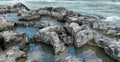 Wild mountain river. Fast water stream moving among stones Royalty Free Stock Photo