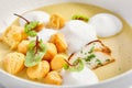 Wild mushroom cream soup with cheese profiteroles Royalty Free Stock Photo