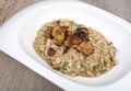 Wild mushroom risotto with herbs and parmesan Royalty Free Stock Photo