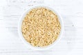 Wild natural rice grains grain raw from above bowl wooden board Royalty Free Stock Photo
