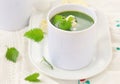 Wild nettle cream soup with blue cheese .