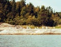 Wild north nature landscape. lot of rocks on lake shore post card view