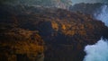 Wild ocean cliff view on storm day closeup. Powerful waves splashing hitting Royalty Free Stock Photo